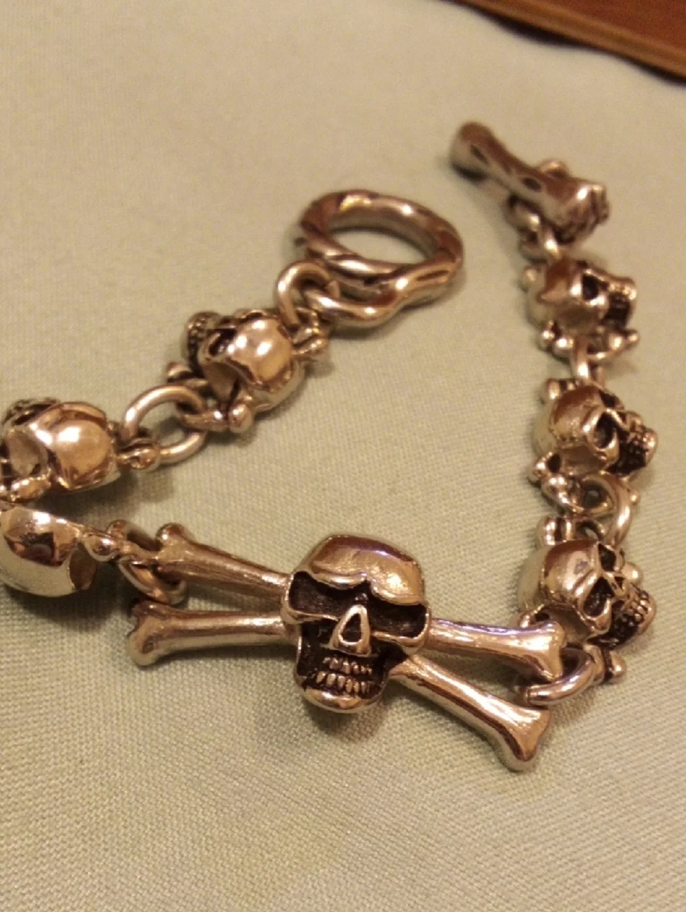 Skull & Crossbones Chunky Bracelet in Metallic Gold Tone